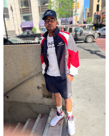 Trail Blazer Set worn as a full look, jacket and shorts in motion -- lifestyle